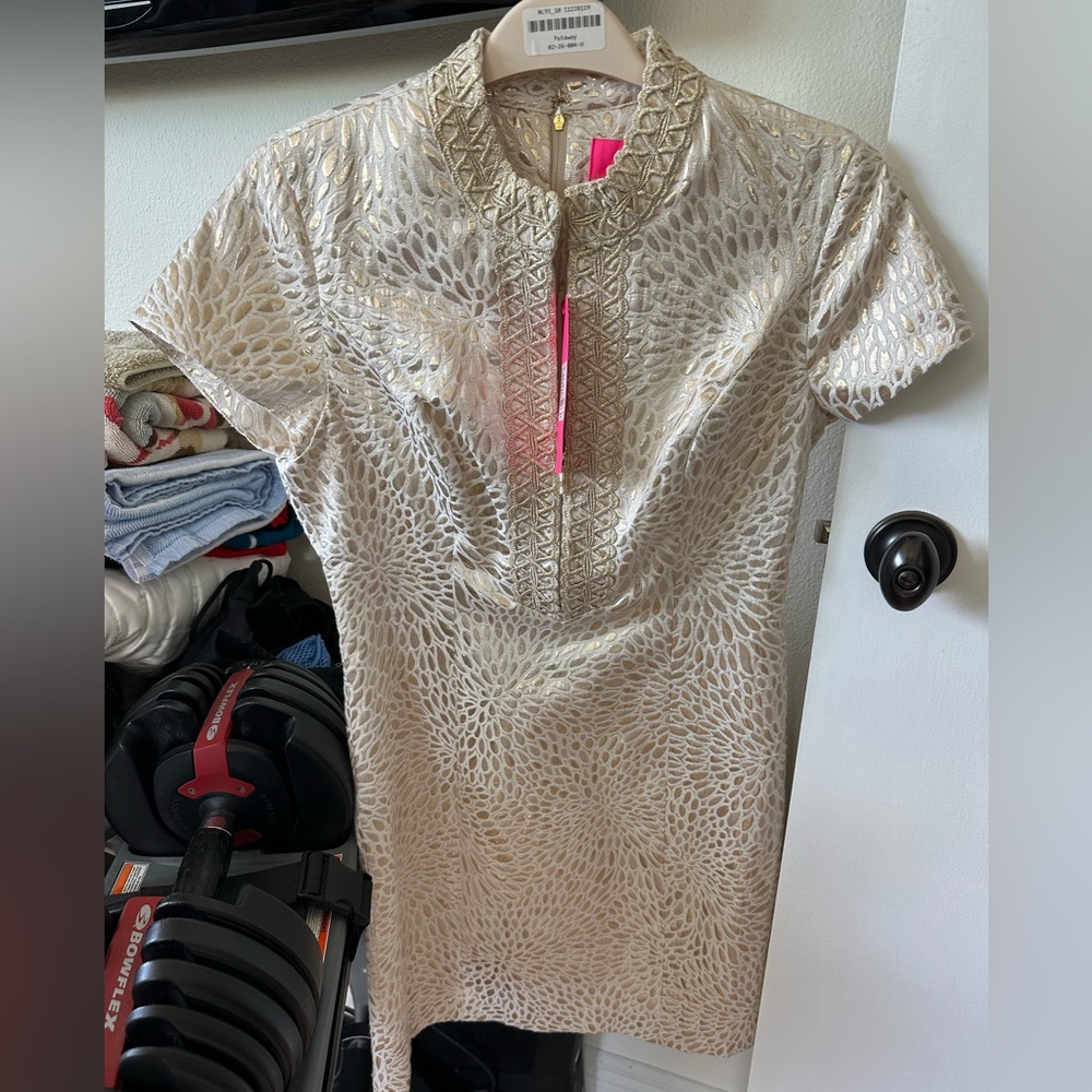 New with tags. Beautiful dress. I bought it and never wore it.